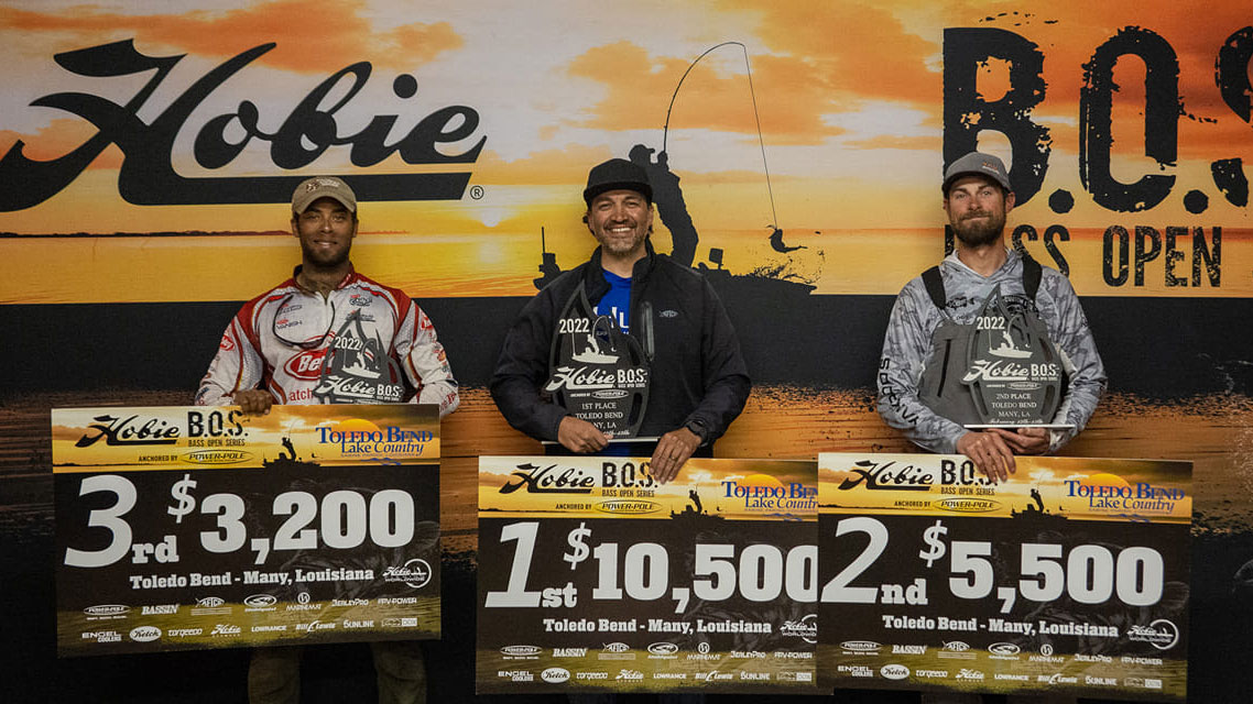 Anglers holding up the big checks at Toledo Bend