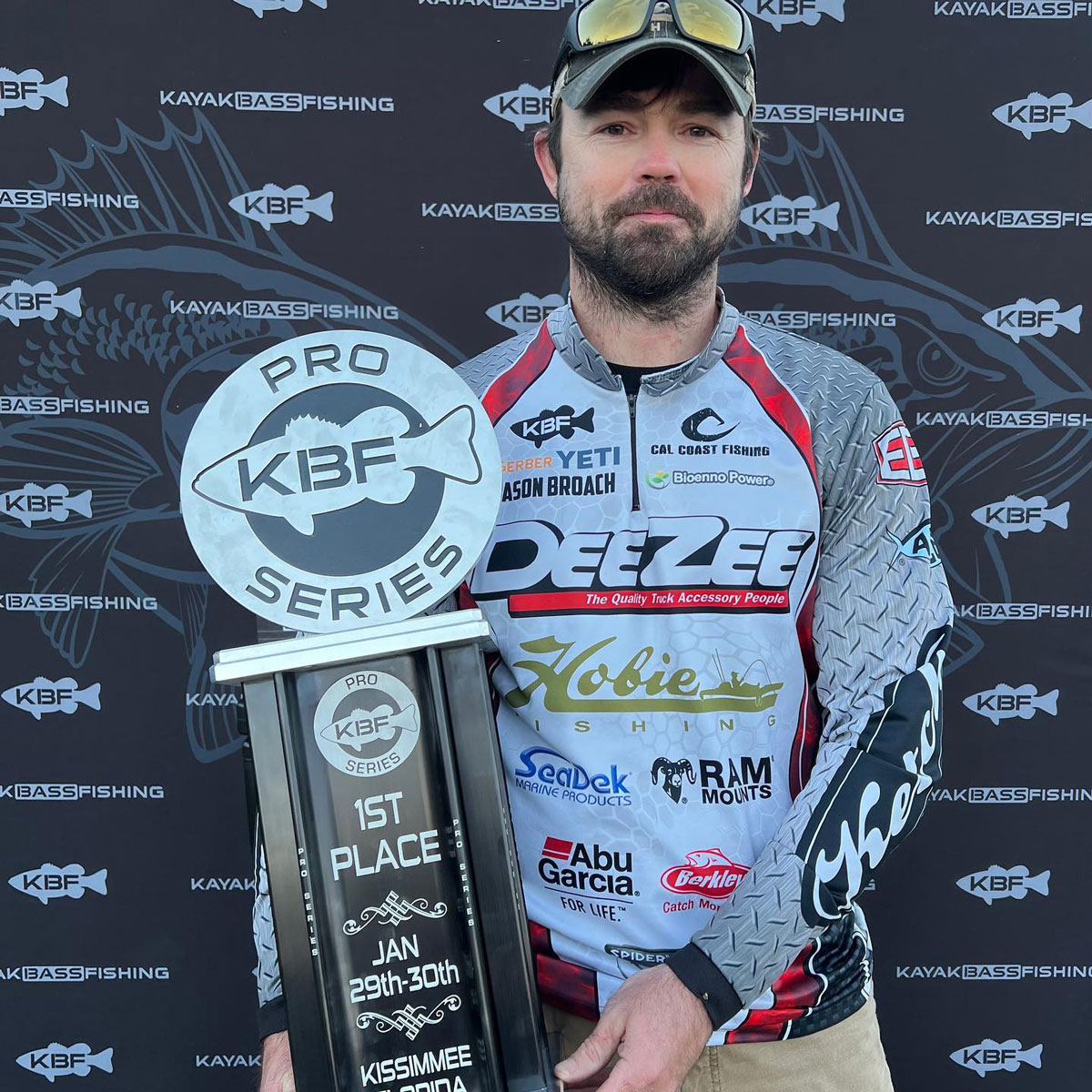 Jason Broach holding the 2022 Kissimmee Pro trophy