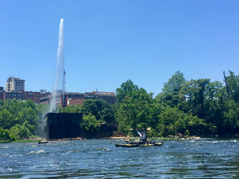 Celebrating a successful voyage through a class 1 rapid on the James River